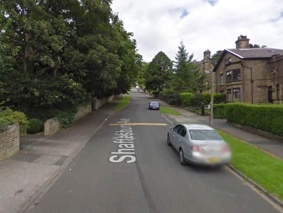 The girl was followed into Shaftesbury Court in Bradford by three men in a car