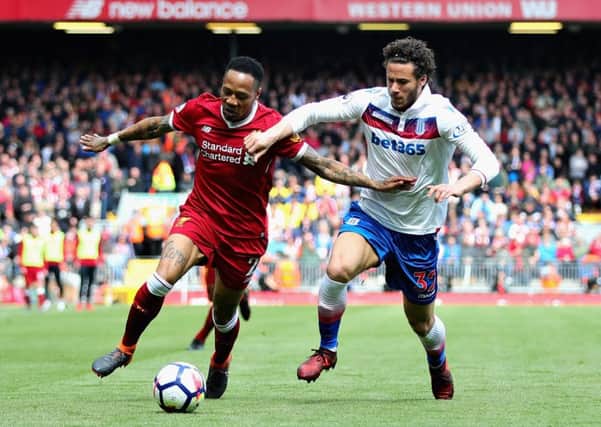 Terriers-bound:  Liverpool's Nathaniel Clyne being challenged by Huddersfield target Ramadan Sobhi Ahmed of Stoke City. Picture: Chris Brunskill Ltd/Getty Images
