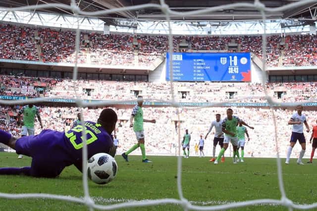 England's Harry Kane (second right) scores his side's second goal at Wembley. Picture: Nick Potts/PA