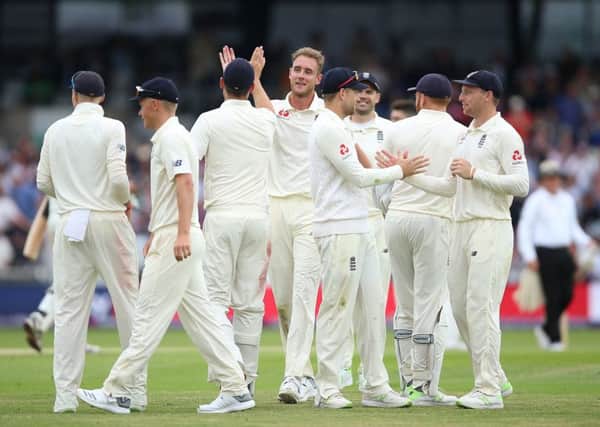 England celebrate their convincing victory over Pakistan after less than three days at Headingley. Picture: Nigel French/PA
