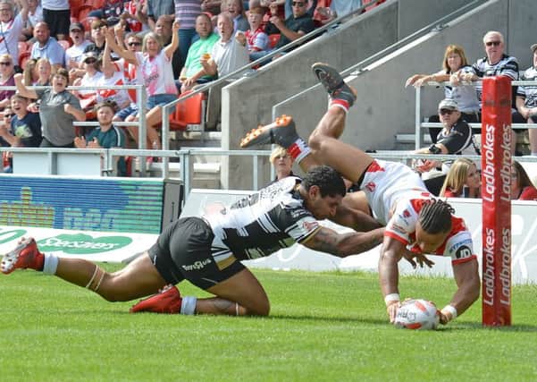 St Helens' Regan Grace scores his sides second try against Hull FC. Picture: Dave Howarth/P