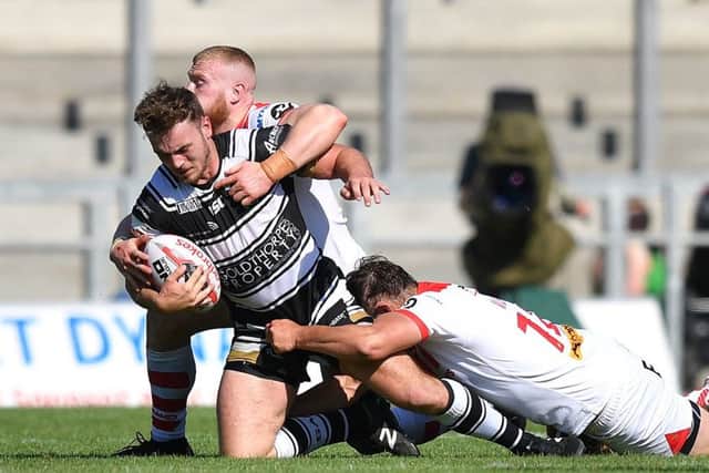 TOUGH DAY: Hull FC's Jack Logan finds his path blocked in Sunday's Challenge Cup quarter-final. Picture: Dave Howarth/PA