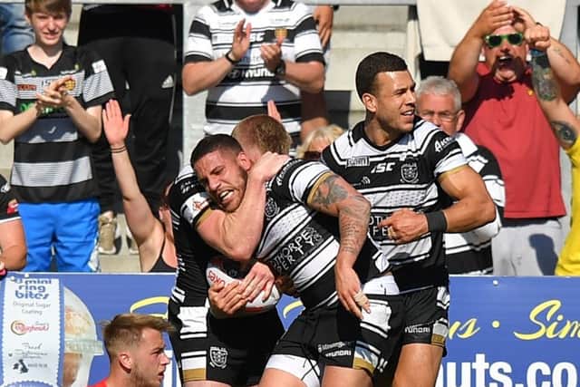 GLUIMMER OF HOPE: Hull FC celebrate their fourth try against Hull FC during Sunday's Challenge Cup, quarter-final. Picture: Dave Howarth/PA