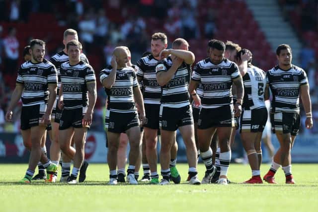 Hull FC's players show their disappointment at the final whistle. Picture by Paul Currie/SWpix.com
