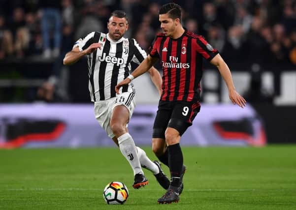 Target: AC Milan's AndrÃ© Silva, right. Picture: Getty Images