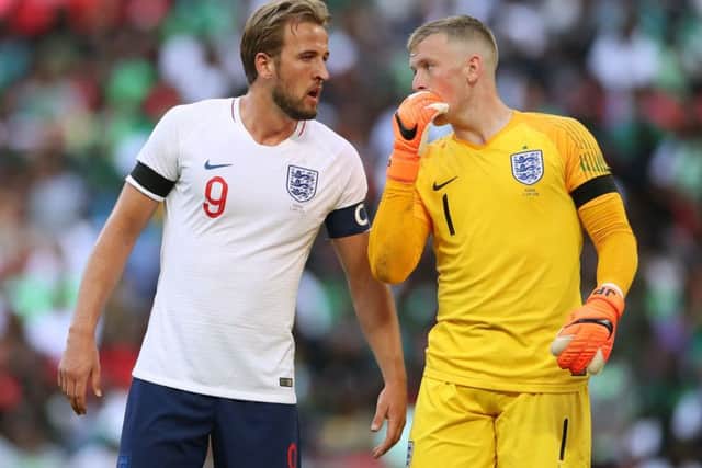 England goalkeeper Jordan Pickford (right) and Harry Kane share a few words during the friendly clash against Nigeria at Wembley on Saturday. Picture: Nick Potts/PA