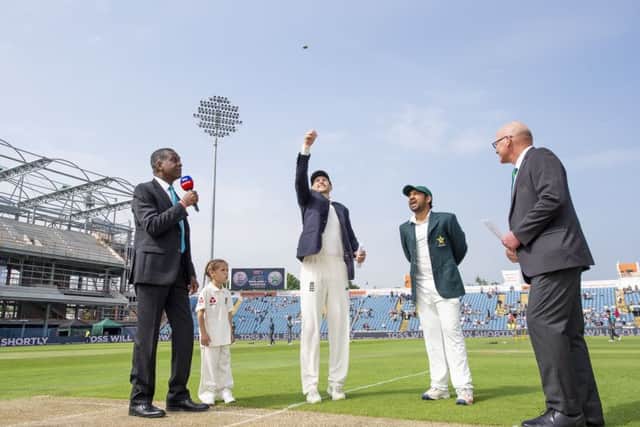 GREAT OCCASION: Joe Root performs the coin toss with Pakistan captain Sarfraz Ahmed. Picture by Allan McKenzie/SWpix.com