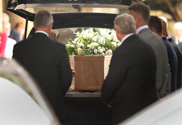 The coffin of 1966 World Cup winner Ray Wilson arrives at Huddersfield Crematorium