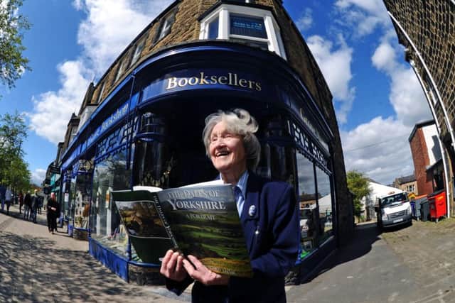 Bookseller, Barbara Steel, 88, outside The Grove Bookshop, Ilkley