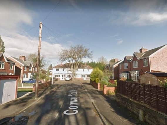 The man has taken to the roof of a property in Conway Square, Scunthorpe. Picture: Google