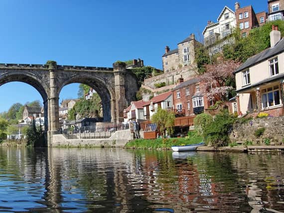 The Waterside in Knaresborough with the viaduct on the left and the start of the cliff on the right.