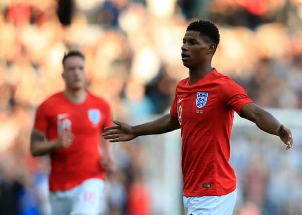England's Marcus Rashford (right) scores his side's first goal of the game during the International Friendly match at Elland Road, Leeds (Picture: PA)
