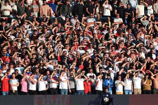 England fans shield their eyes from the sun during the International Friendly match at Elland Road, Leeds. (Picture: PA)