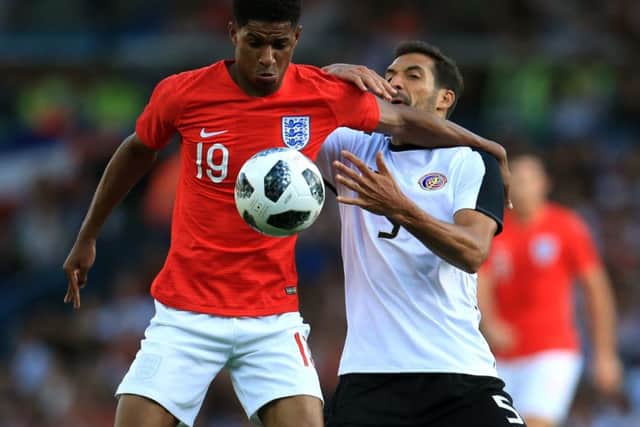 England's Marcus Rashford (left) and Costa Rica's Celso Borges battle for the ball (Picture: PA)