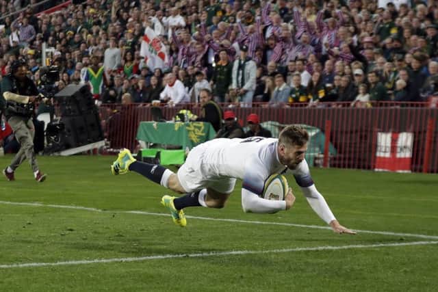 England's Elliot Daly scores an early try at Ellis Park. Picture: AP/Themba Hadebe