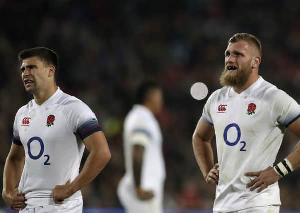 England's Brad Shields, right, with teammate Ben Youngs looks dejected at Ellis Park. Picture: AP/Themba Hadebe