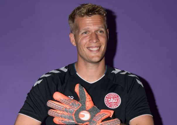 In safe hands:  Denmark back-up goalkeeper Jonas Lossl. Picture: Stuart Franklin - FIFA/FIFA via Getty Images