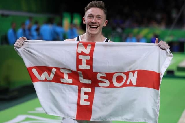 England's Nile Wilson celebrates winning a gold medal in the Men's Individual All-Around Final at the Gold Coast Commonwealth Games. Picture: Mike Egerton/PA.