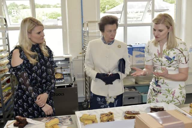 Princess Anne with Lucy and Jane Batham, the owners of Tarte and Berry bakery in Leeds. Picture by Steve Riding.
