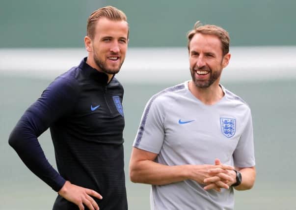 England manager Gareth Southgate, right, with his captain Harry Kane.