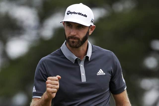LEADING MAN: Dustin Johnson reacts after making a putt for birdie on the fourth green during the second round of the U.S. Open. Picture: AP/Seth Wenig