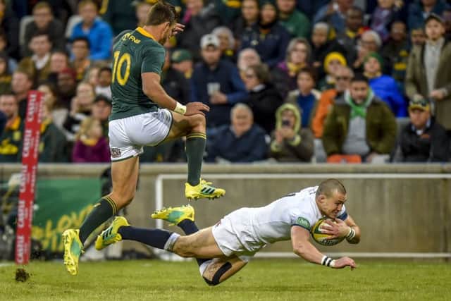 South Africa's Handre Pollard can't stop England's Mike Brown from scoring early on during the second Test match in Bloemfontein. Picture: AP/Christiaan Kotze