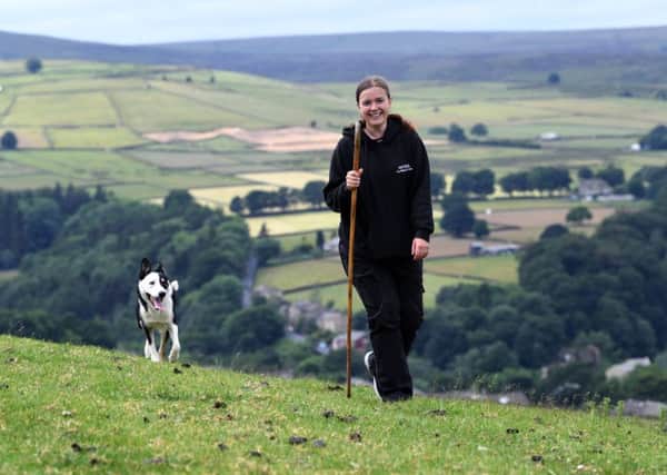 Faye Smith, 24, with border collie Taff, who have completed a sheepdog training course at Askham Bryan College near York. Picture by Jonathan Gawthorpe.