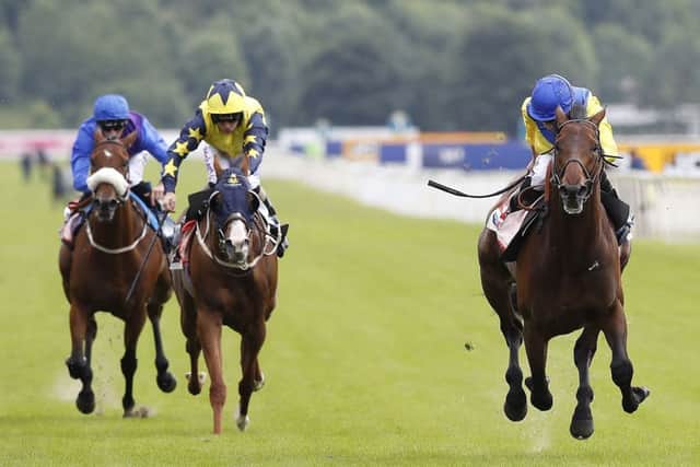 Marmelo and Ryan Moore win The Sky Bet Grand Cup at York. Picture: Martin Rickett/PA