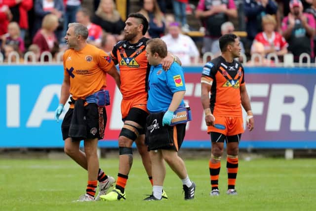 Castleford Tigers' Jesse Sene-Lefao limps offinjured in the 24-24 draw with Hull KR. Picture: Richard Sellers/PA