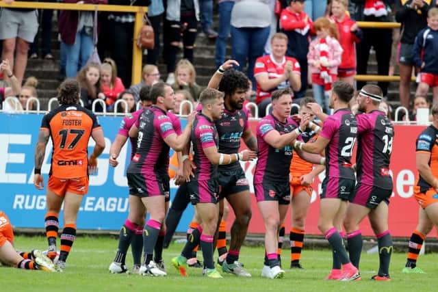 Hull KR celebrate after Hull KR's Mose Masoe scores a try against Castleford. Picture: Richard Sellers/PA