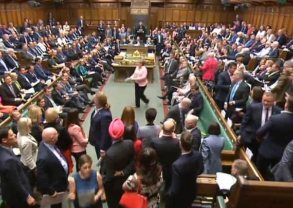 SNP MPs walk out of the House of Commons during Prime Minister's Questions after the party's Westminster leader Ian Blackford was kicked out of Commons sittings for the rest of the day after repeatedly challenging Speaker John Bercow.
