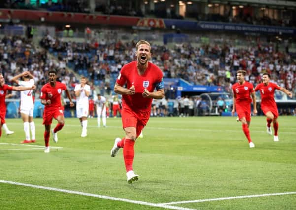 YOU BEAUTY!! England's Harry Kane (centre) celebrates scoring his side's late winning goal at The Volgograd Arena. Picture: Adam Davy/PA