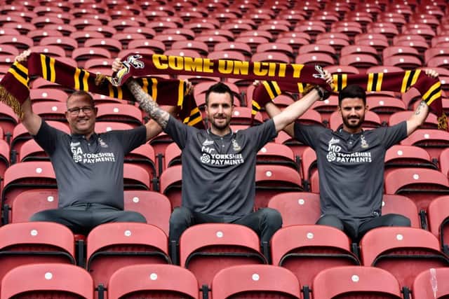 Bradford City's new head coach Michael Collins , centre, with assistants Greg Abbott, left, & Martin Drury, right. Picture: Andy Garbutt
