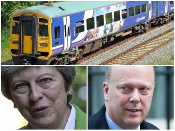 Political pressure is growing on Theresa May and Chris Grayling over rail services.