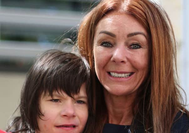 File photo dated 11/06/18 of Charlotte Caldwell, with her son Billy, who has called for a meeting with the Home Secretary Sajid Javid to discuss legalising a medical cannabis treatment for children with similar conditions.