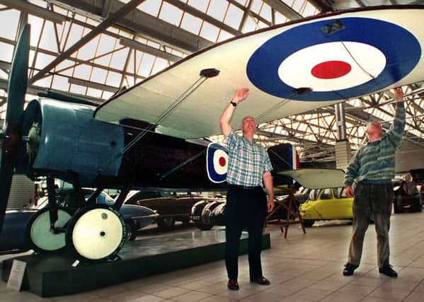 Bob Richardson  ( left ) , chairman of the Northern Aeroplane Workshop and Eric Barraclough the co-ordinator,  with a Bristol fighter plane that the Workshop has spent years making . The aircraft is on display at the Skopos Motor Museum , Alexandra Mills ,  Batley .