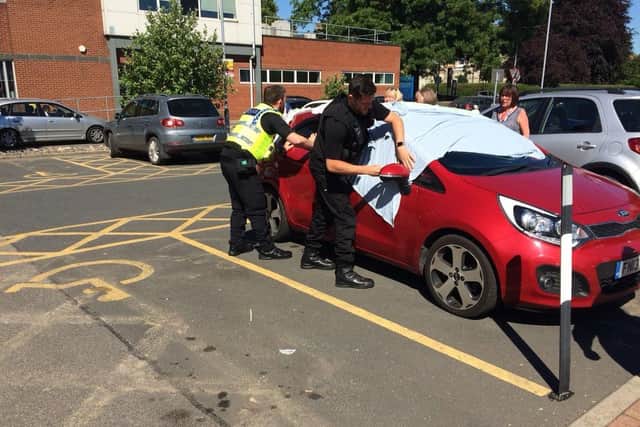 Police officers in Yorkshire have rescued two dogs from a hot car. Image: North Yorkshire Police.
