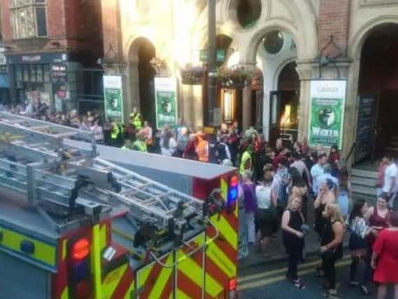 The scene outside Leeds Grand during the evacuation
