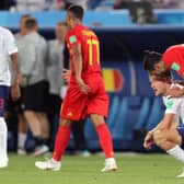 England's Jamie Vardy, second right, is consoled by Belgium's Nacer Chadli after the match at Kaliningrad Stadium (Picture: Owen Humphreys/PA Wire).