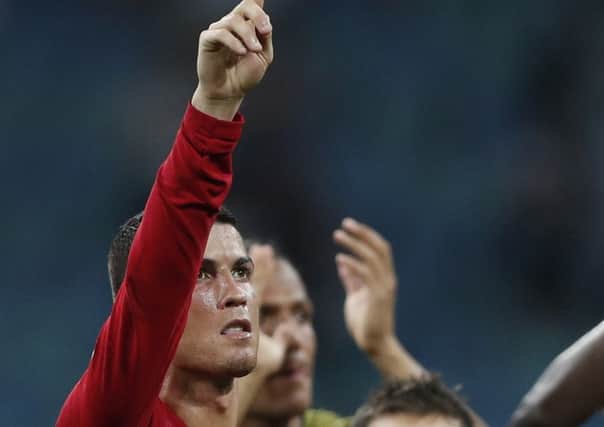 Portugal's Cristiano Ronaldo: Celebrating after the Group B match against Spain.