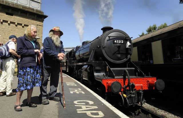 Train Enthusiasts Peter Keating and Margaret Burrows on the platform at Keighley Station. Picture by Simon Hulme