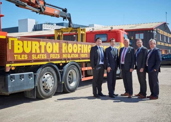 Pictured (l-r) - Jonathan Fisher and Daniel Hammond of Andrew Jackson Solicitors with Burton Roofing's managing director, Paul Hattee; Lee Hustwait, finance director; and Andrew Cowham, operations director