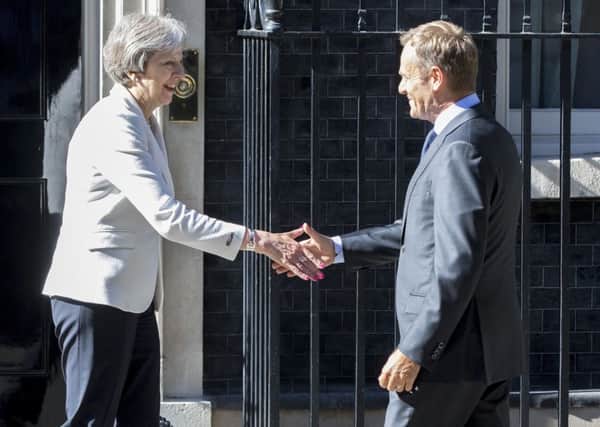 Prime Minister Theresa May greets President of the European Council Donald Tusk outside No 10 Downing Street, London, for bilateral talks that were held last month.