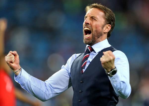 England manager Gareth Southgate celebrates England's penalty shootout win over Colombia.
