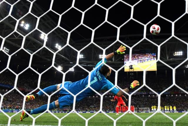 On target:  Kieran Trippier slots home his penalty against Colombia. Picture: Getty Images