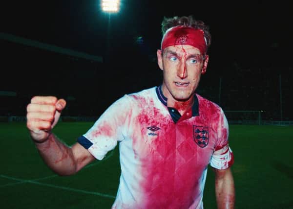 Hero:  England's  bloodied defender Terry Butcher celebrates after the 1990  goalless draw against Sweden. Picture: Getty Images