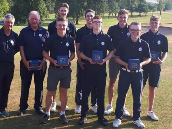 Coach Steve Robinson, back row left, and manager Phil Woodcock with Yorkshire Boys team after their success at Pleasington.