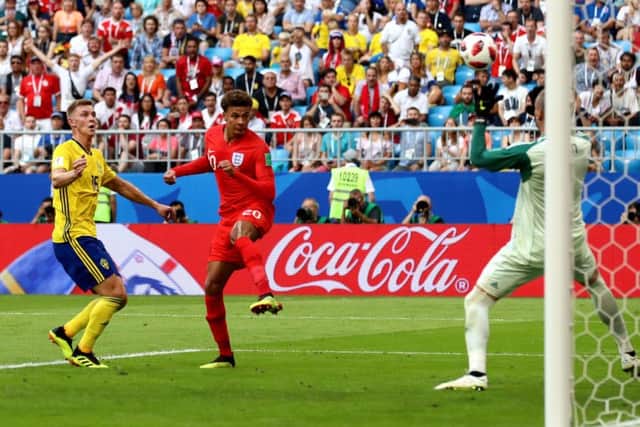 England's Dele Alli scores his side's second goal of the game against Sweden. Picture: Tim Goode/PA