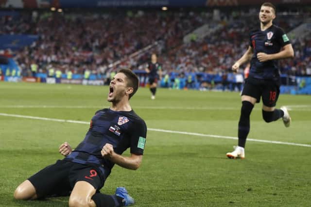 Croatia's Andrej Kramaric celebrates his side's opening goal against Russia. Picture: AP/Darko Bandic