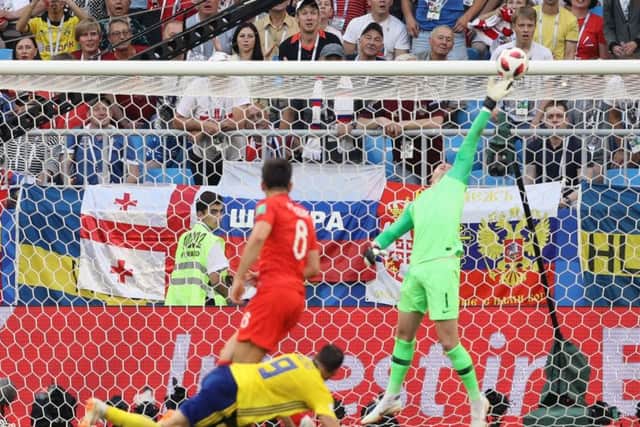 England goalkeeper Jordan Pickford makes a stunning save to deny Sweden a goal. Picture: Owen Humphreys/PA